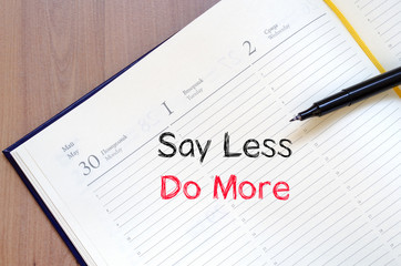 Say less do more concept on notebook