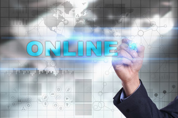 Businessman is drawing on virtual screen. online concept.