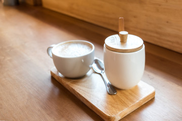 warm vintage concept : empty hot cappuccino coffee cup in cafe s