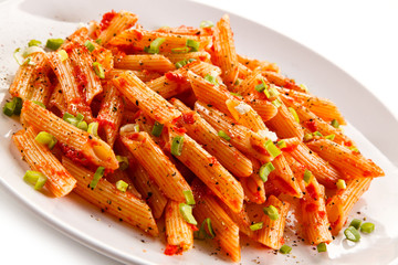 Pasta with pesto sauce and vegetables 