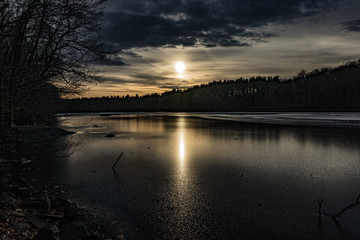 Frozen lake at sunset