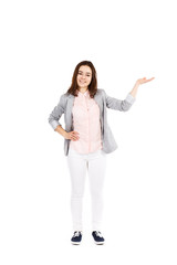 Woman pointing on white background 