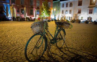 Fototapeta na wymiar Bicycle with flower baskets