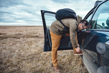 Hiker preparing footwear