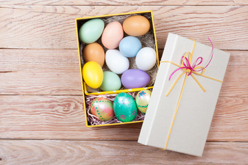 Colorful Easter Eggs decorated in beautiful giftbox