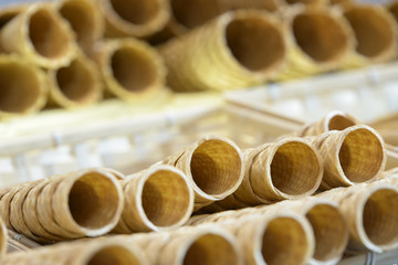 waffle cone ready to be filled with ice cream on showcase