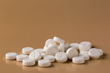 Heap of round white pills