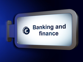 Banking concept: Banking And Finance and Euro Coin on billboard background