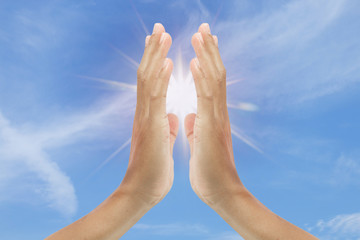 hand sign with blue sky background