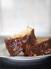 Two slices of homemade cake with daylight