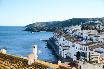 rooftop view cityscape of Dali famous landmark spanish village Cadaques port on blue mediterranean...