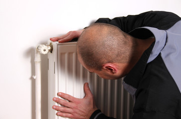 Repairman checking the radiator