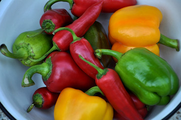 A mixture of different colors and types of sweet fruit and pepper