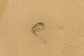 Fußabdruck im Sand am Strand