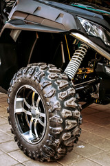 Sports ATV standing on the pavement 