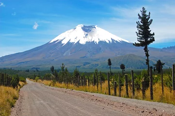 Foto op Aluminium Dirt road that leads to the majestic Cotopaxi (the highest active volcano in the world), in the heart of the Andes, Ecuador, South America. © alanfalcony