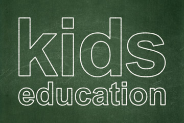 Obraz premium Education concept: Kids Education on chalkboard background