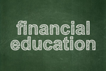 Obraz premium Learning concept: Financial Education on chalkboard background