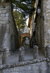 Fototapeta na wymiar Narrow street in the old town San Marino in Italy.