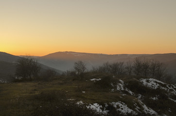 Beautiful landscape in the mountains with the sun at dawn. Mountains at the sunset time. Azerbaijan, Big Caucasus
