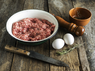 Lamb mince in metallic bowl,