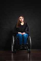 Obraz na płótnie Canvas Sad girl on wheelchair.