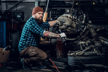 Mechanic man in a garage.
