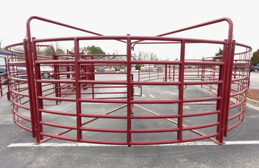 New for sale red steel farm or ranch corral.