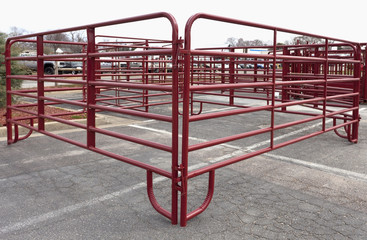 New for sale red steel farm or ranch corral.