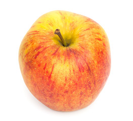Fresh yellow-red apple isolated on white. Close-up, top view.