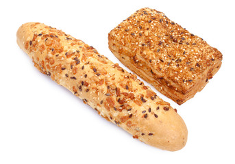 Pair of spicy bun sprinkled with sesame seeds isolated on white