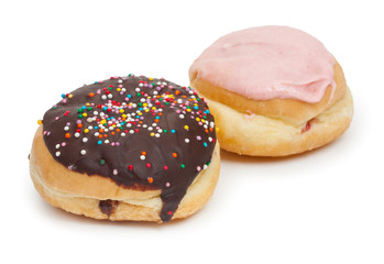 Donuts with chocolate icing and sprinkles and donut with cherry