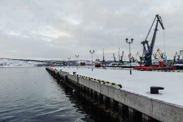 Cranes in sea port of loading
