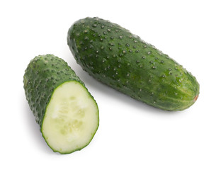 Pair of fresh cucumbers isolated over white background.