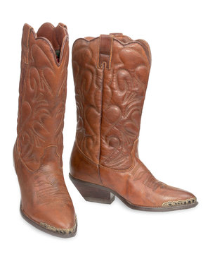 Women's fashion boots. Ladies vintage leather cowboy shoes. Isol