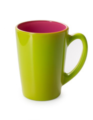 Green and violet cup for coffee or milk isolated on white backgr