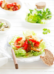 Roast chicken with vegetables and salad.