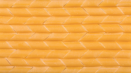 Italian pasta macaroni background, close up, top view