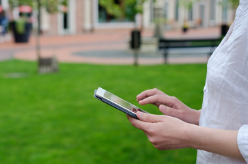 Woman use the tablet.