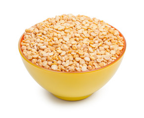 Orange and yellow colors ceramic bowl with dried peas isolated o