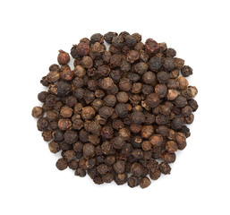 The seeds of black pepper, a heap, top view on a white backgroun