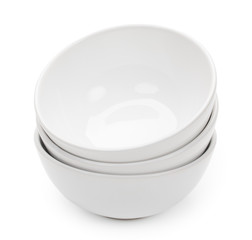 Little round white ceramic bowls for food products, isolated on