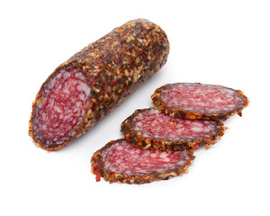 Fototapeta na wymiar Sliced salami with spices isolated on white background