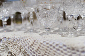 Empty glasses for party celebration event on light background. Closeup image