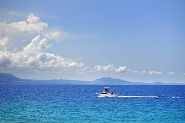 Saltwater fishing in Dominican republic - fshing boat in deep blue ocean.