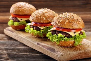 Hamburger with beef meat and fresh vegetables