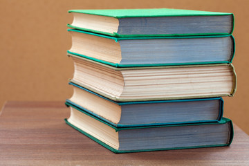 books on a wooden table.