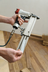 Installing a wooden floor.