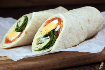 egg cheese and salomon sandwich wrap in tortilla