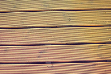 Outdoors wooden background, closeup view image